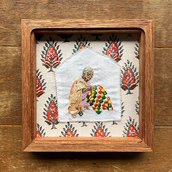 インドの女性の刺繍-